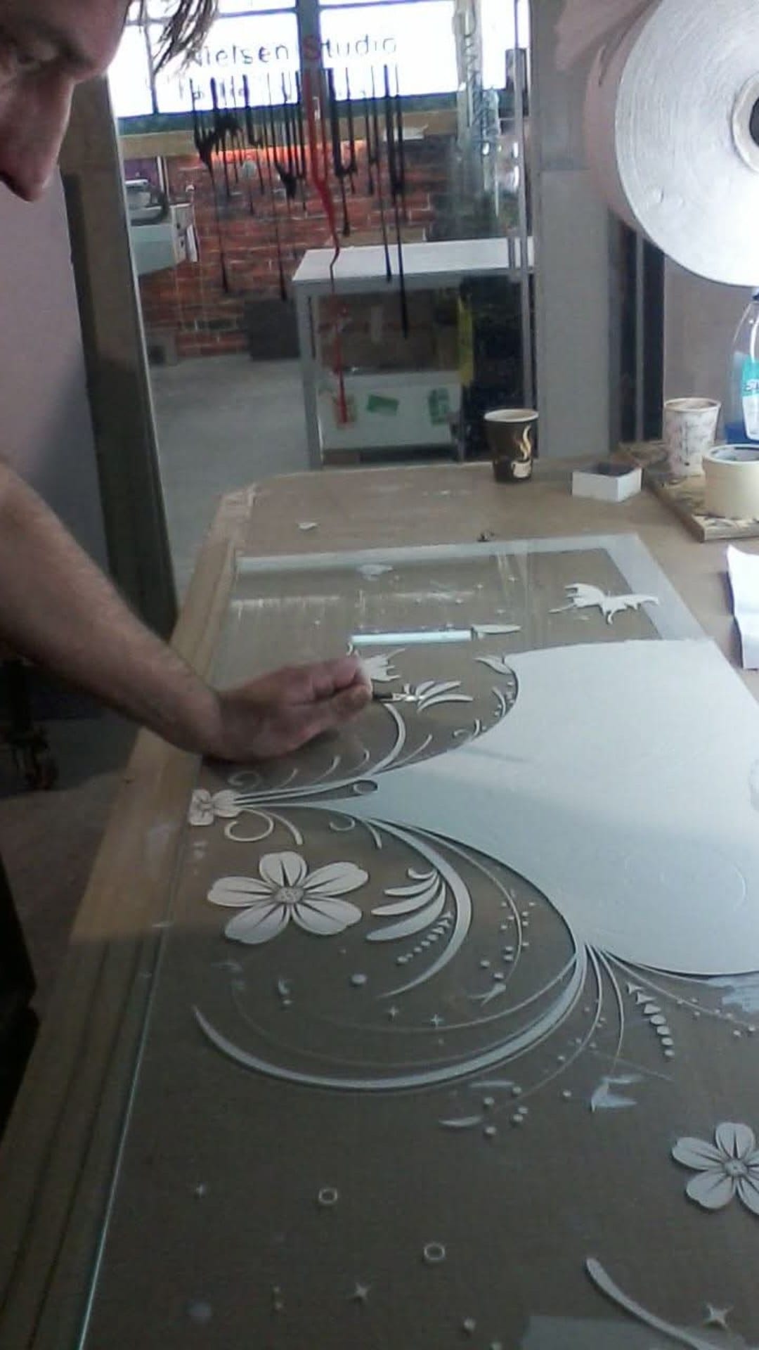 Hand work on a decorative panel